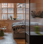 Bedroom_with_reeded_glass_wall_by_Nicholas_Worley_in_Manchester