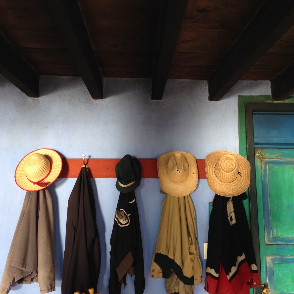 Casa_Palopo_in_Guatemala_rustic_scene_straw_hats