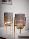 Cox_and_Cox_grey_fluted_tea_light_holder_with_brass_legs
