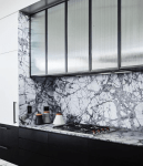 Decus_Interiors_Killcare_Kitchen_with_Reeded_glass_cabinet_doors_and steel